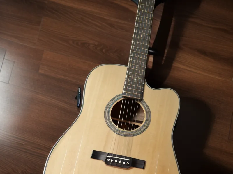 Metrónomo en el celular junto a púa y capo para medir el progreso en la guitarra