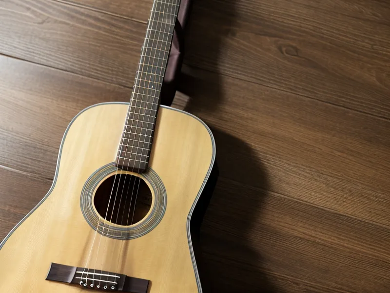 Espacio ordenado en casa para practicar acordes de guitarra siguiendo un curso online estructurado